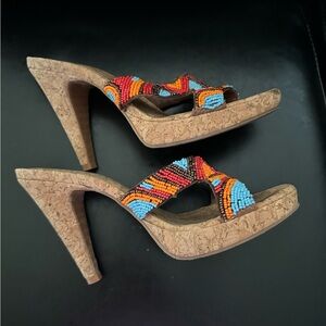 Gianni Bini cork, low platform sandals with blue, orange, and brown beading.